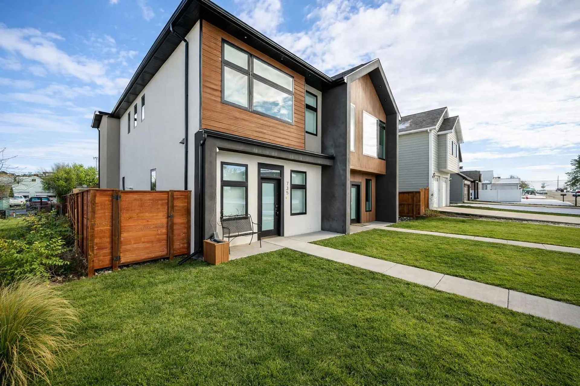 The Zen Den — modern townhouse exterior with wood accent siding in Sheridan, Wyoming