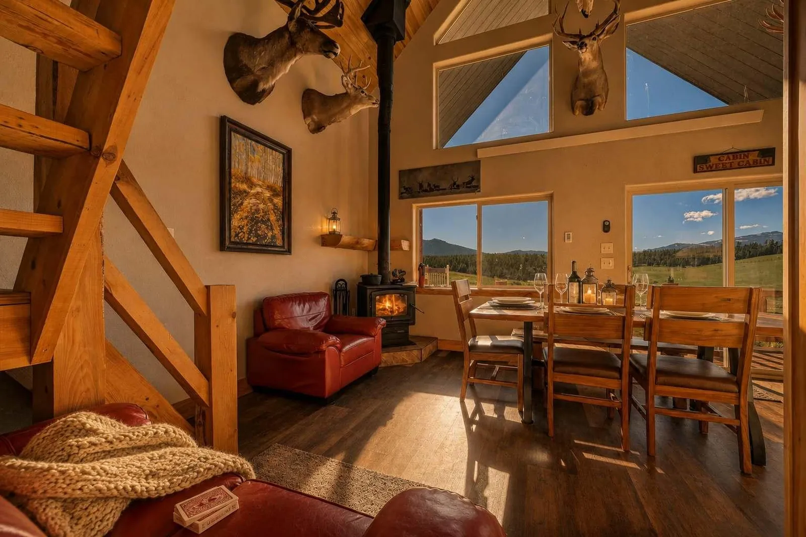 Fireplace and dining table inside Piton cabin in the Bighorn Mountains near Buffalo, Wyoming