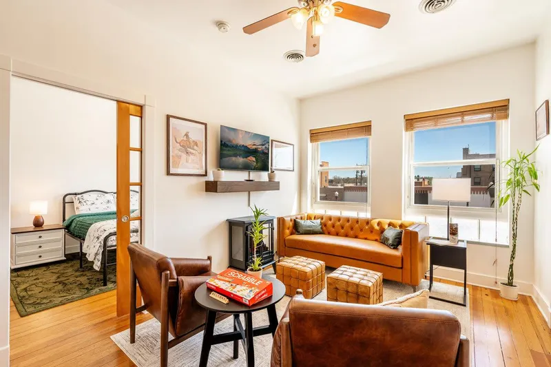 Paloma on Main living room with Main Street views — Casa Vaquera, Sheridan, Wyoming