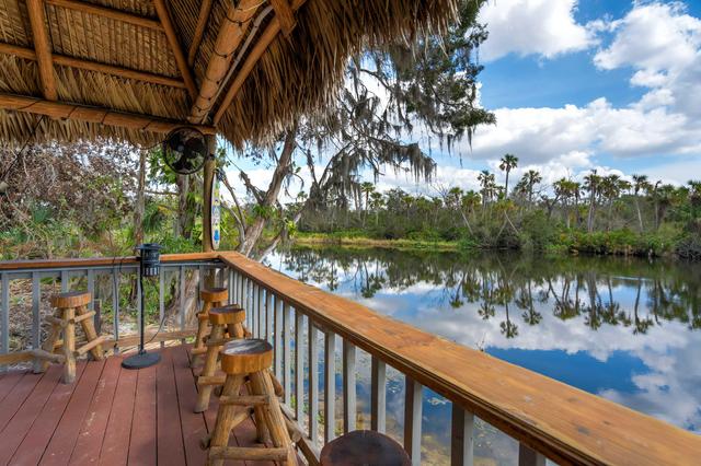 Riverside Hut! Cozy Getaway w/ Tiki Hut & Firepit
