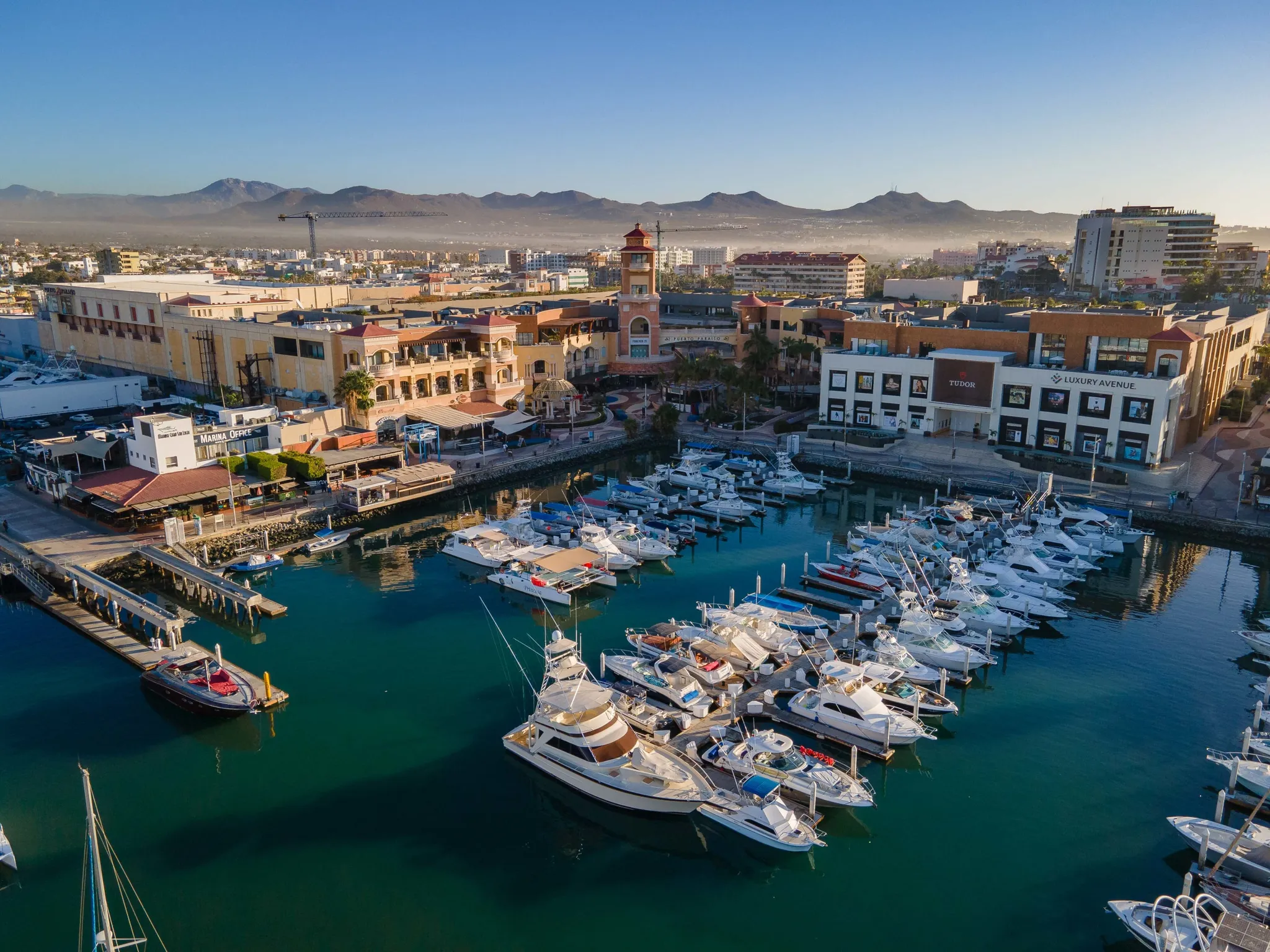 Yachts and buildings at a harbor in Cabo San Lucas, Baja California Sur, Mexico.