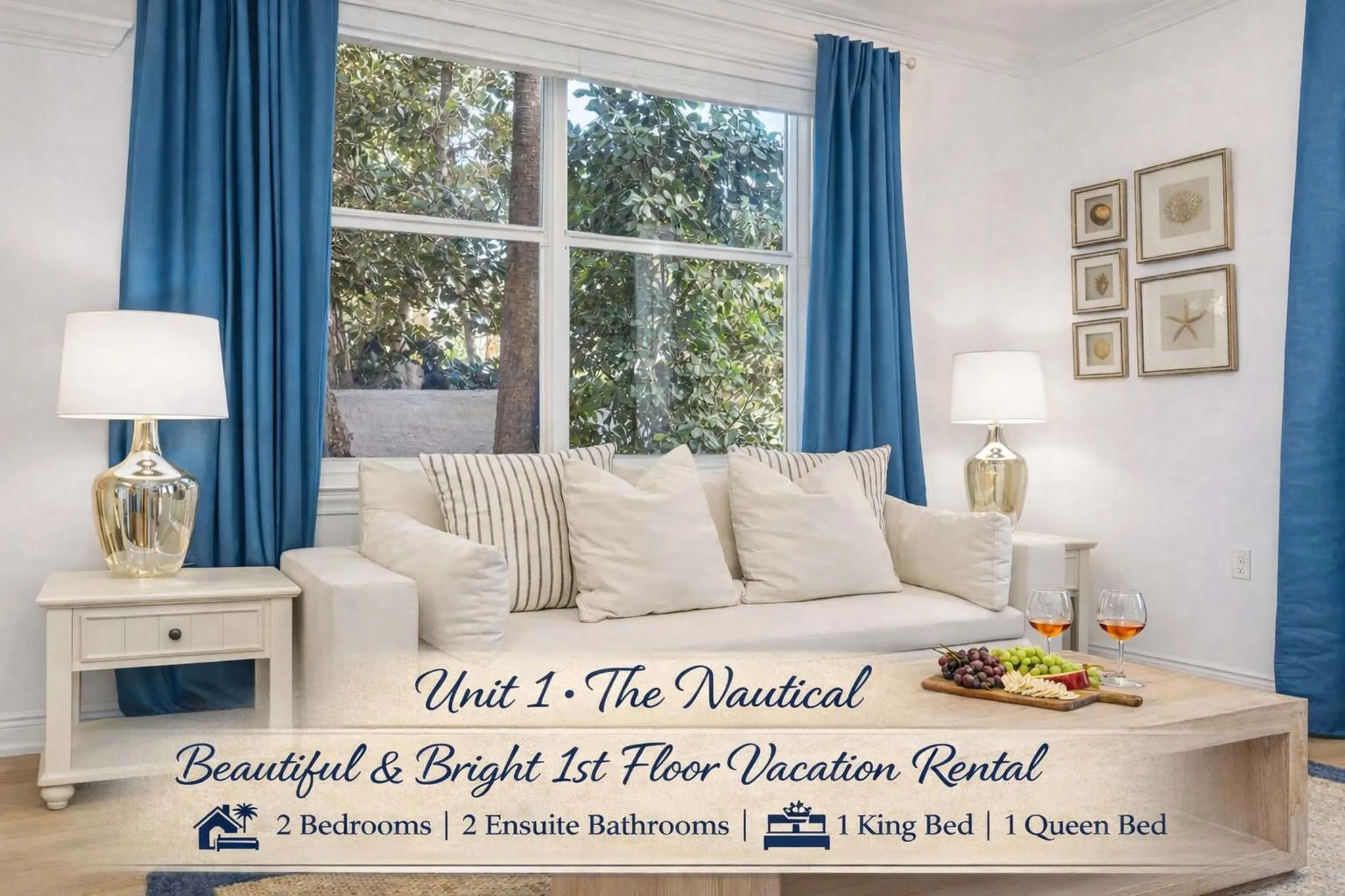 Bright living room with a sofa, large window, and nautical decor