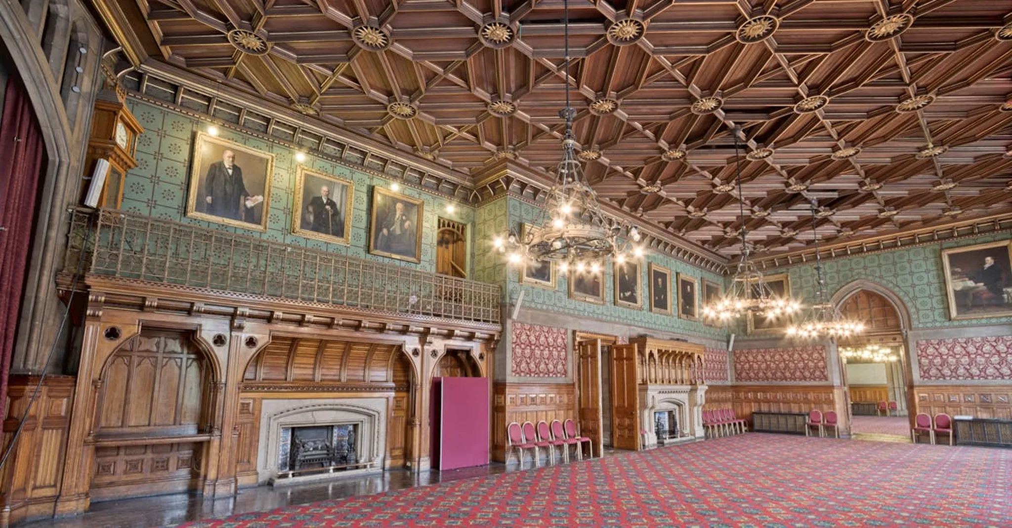 Explore the grand, historic interior of Manchester Town Hall with vintage decor.