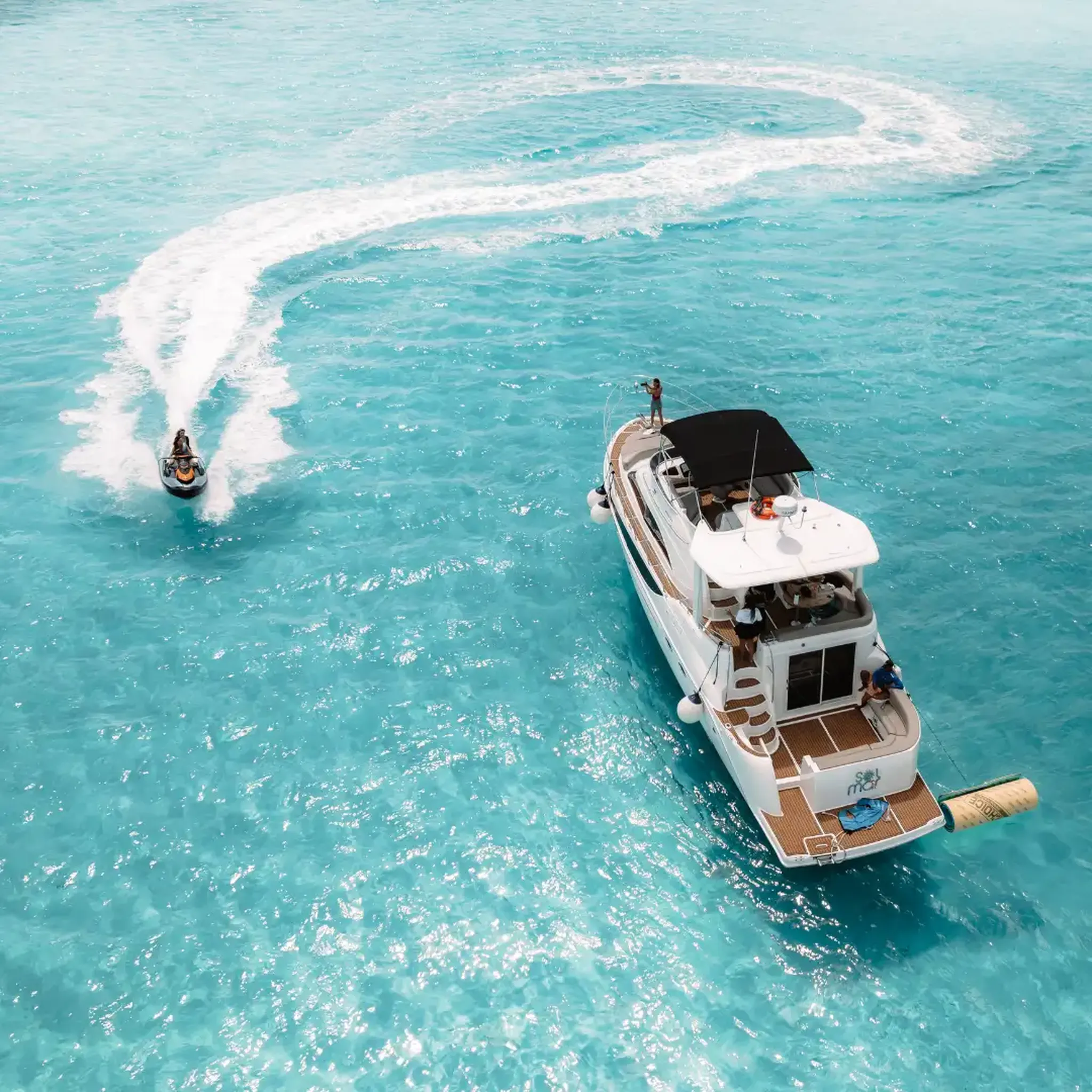 Luxury yacht cruising in turquoise waters in Isla Mujeres