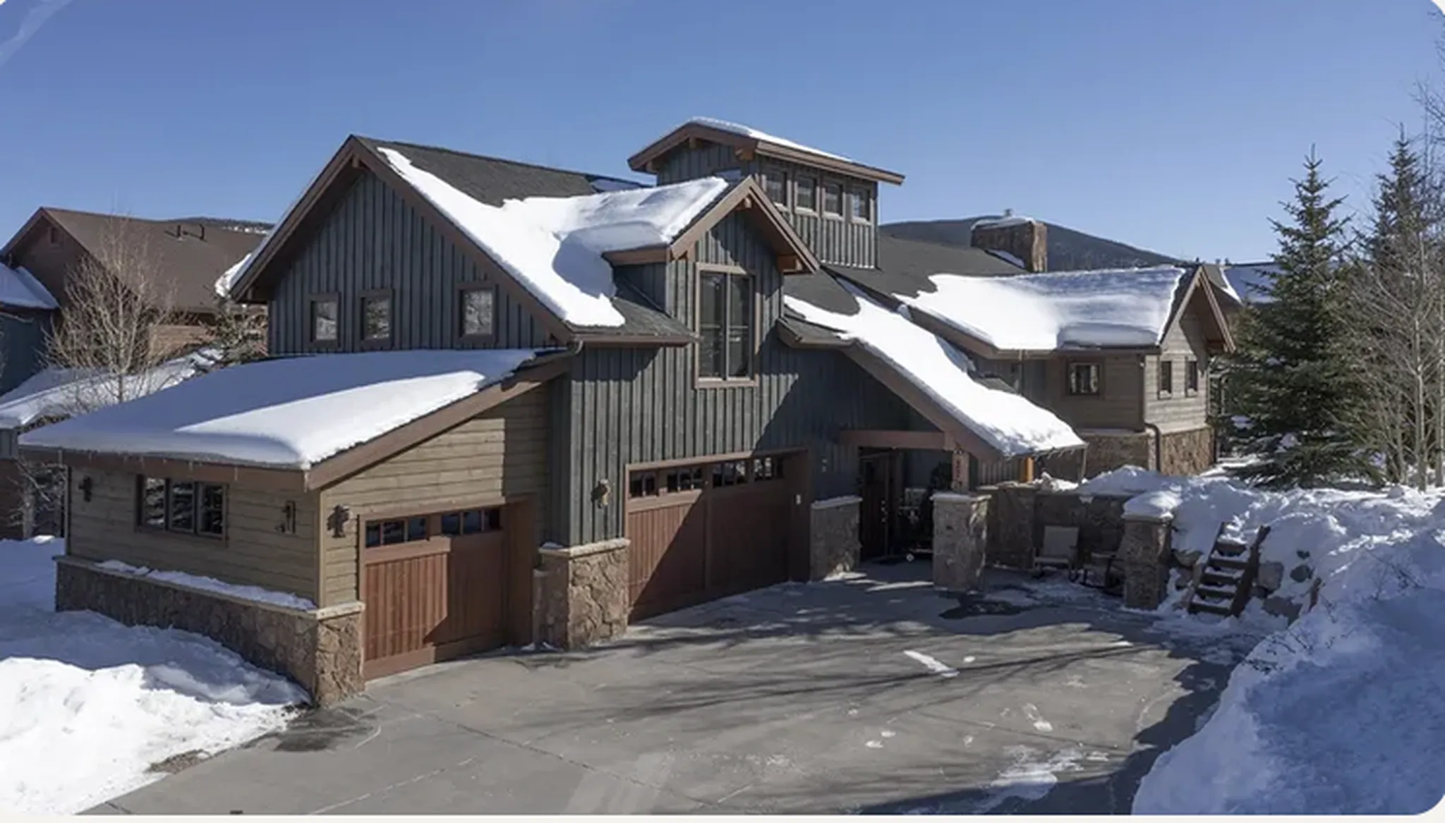 Alpine Vista, a Luxe Living home in Breckenridge, with its hot tub deck in the snow