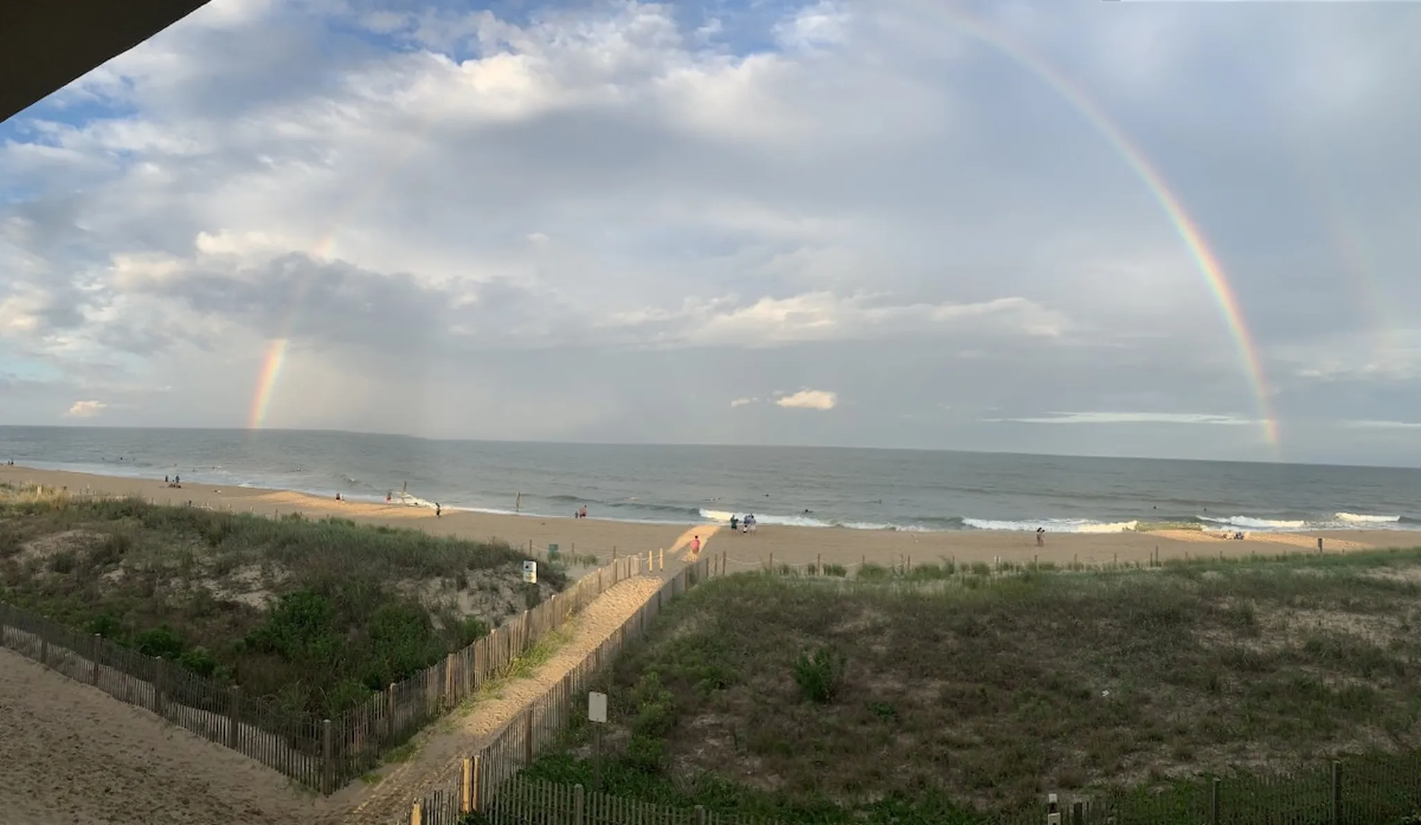 A wide view of the beach at 46th Street after a storm, seen from a Salty Sands balcony