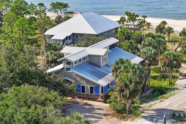 Secluded Palms - Charming Beachfront Cottage with private beach access on Indian Pass