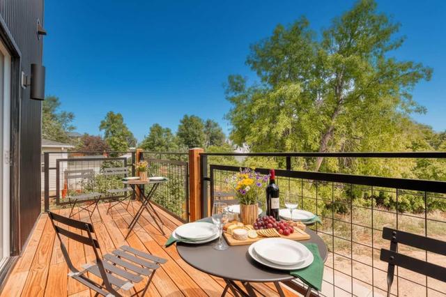 Wyo Stays | Main Street Retreat in Downtown Sheridan | Stylish 2BR, 3BA with Private Studio, Chef Kitchen, Outdoor Deck, Walkable to Shops and Dining