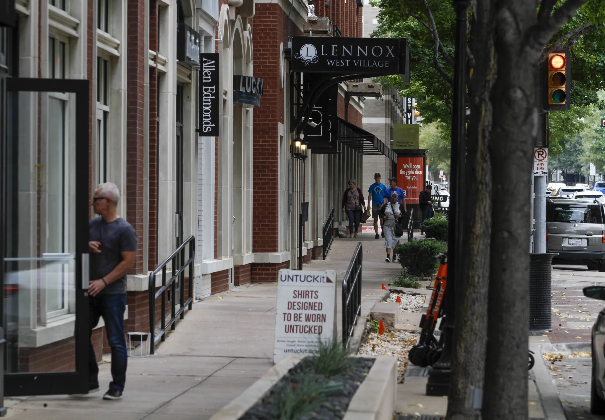 Pedestrians enjoying cafes and boutiques along McKinney Avenue in Uptown Dallas