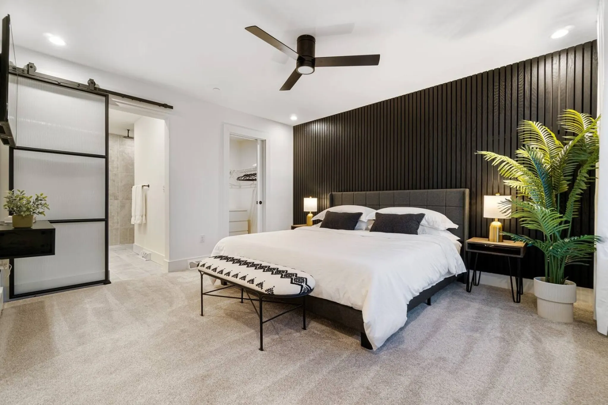 2 chairs on a deck on lake side