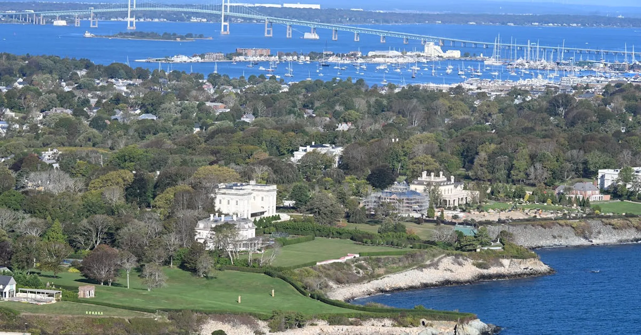 Explore the iconic Newport mansions with a stunning view of Narragansett Bay and Claiborne Pell Newport Bridge.