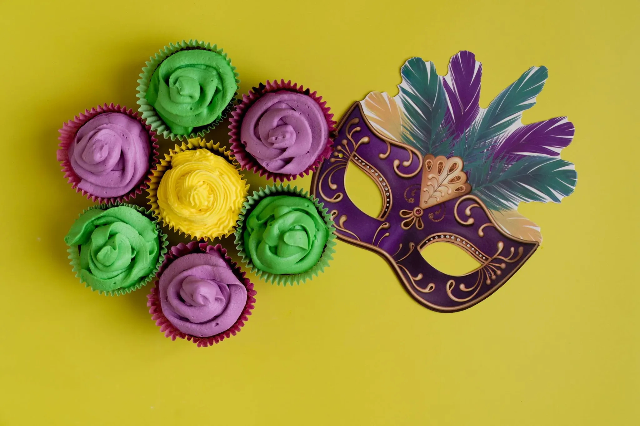 Image of a mask and cupcake